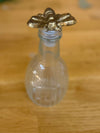 The Ritual Vessel — Ridged Glass Bottle with Golden Bee Stopper
